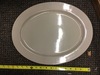 Beige oval plastic tray