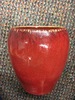 Red ceramic vase