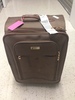 Wheeled brown suitcase