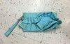 90's turquoise frilly clutch