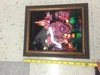 Dark wood picture frame with picture