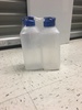 Plastic water bottle blue top