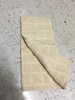 Tan grid pattern dish towel