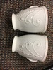 set of white ceramic mugs