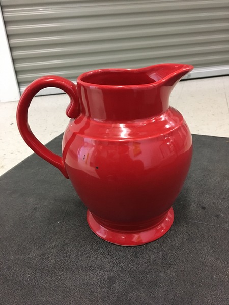 Red ceramic pitcher