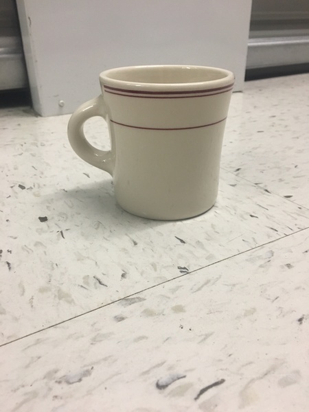 Ceramic mug with red ring
