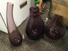 Set of (3) purple glass vases