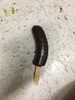 Chocolate covered banana on a stick