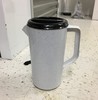 White speckled pitcher with black top