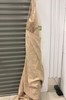 Tan curtain with netted top