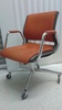 102.3 - Orange Rolling Office Chair with Chrome Base